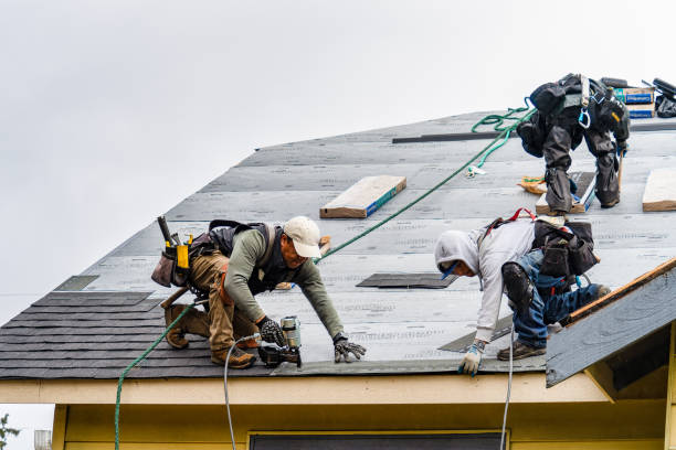 Professional Roofing technician working in Somerset, MA